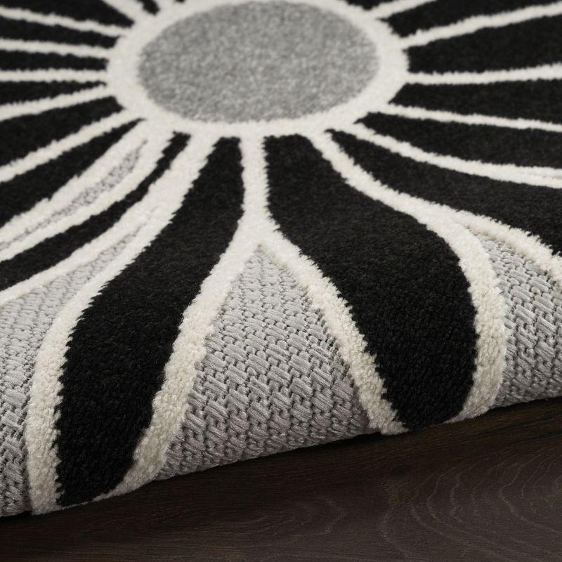 Aloha Daisy Black and White 5'3" x 7'5" Synthetic Outdoor Rug