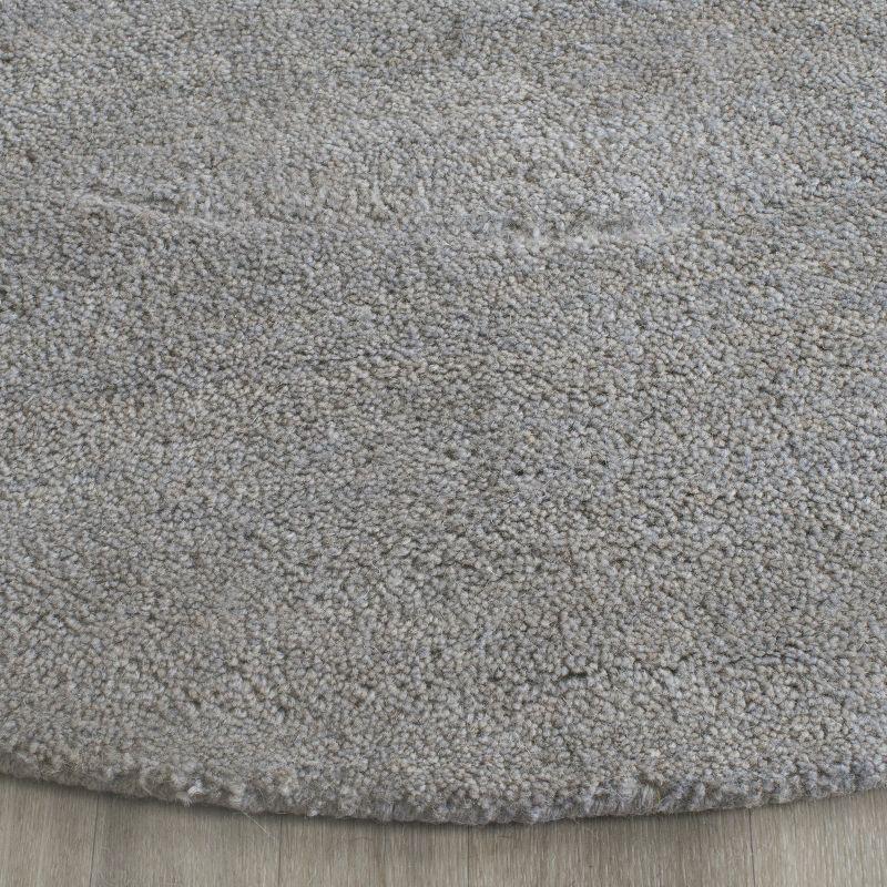 Himalaya HIM610 Handmade Area Rug - 8' Round - Grey - Safavieh