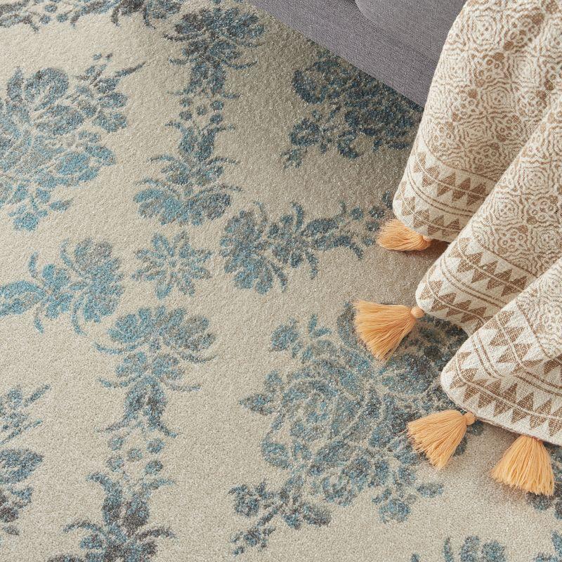 Elegant Ivory and Turquoise Floral Synthetic 6' x 9' Area Rug