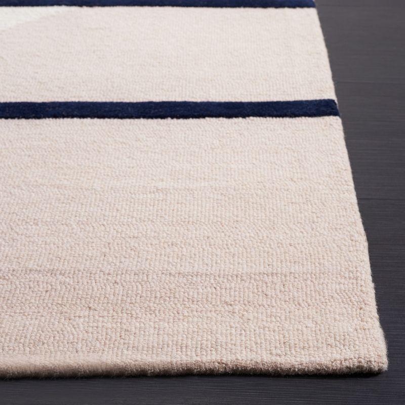 Rodeo Drive RD883 Hand Tufted Indoor Area Rug - 6'x9' - Blush/Black - Safavieh