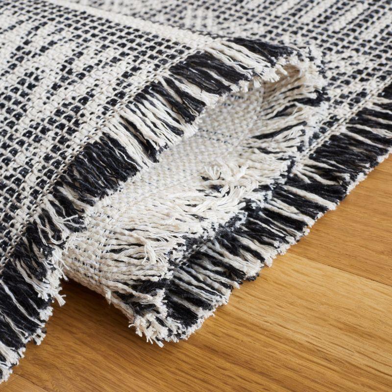 Augustine Black and White 4' x 6' Flat Woven Synthetic Rug