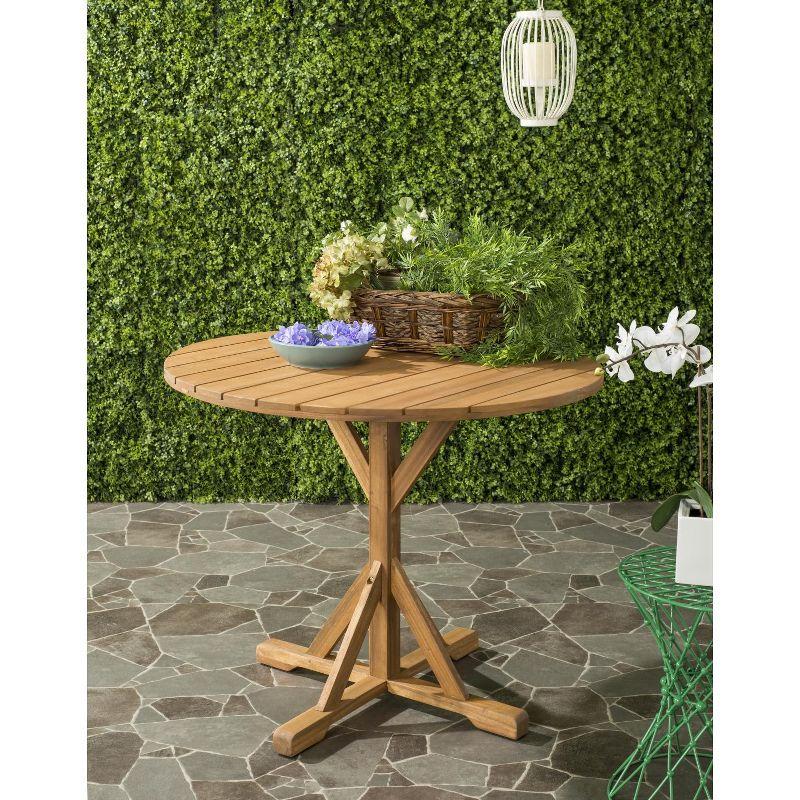 Arcata Round Table - Indoor/Outdoor - PAT6735 - Natural - Safavieh