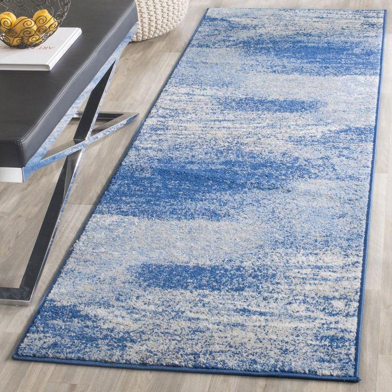 Reversible Silver and Blue Abstract Synthetic Area Rug