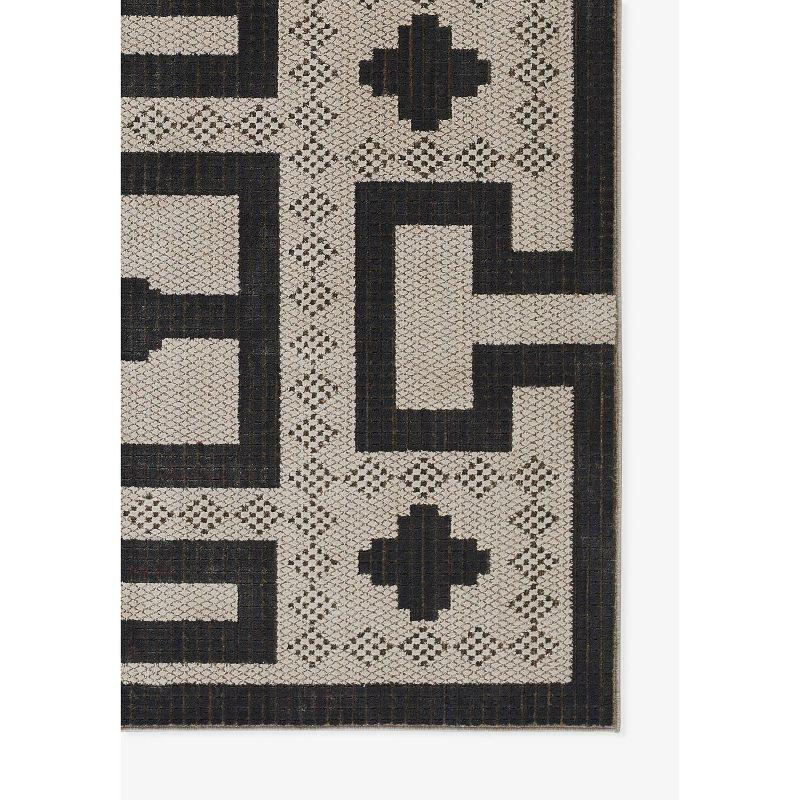 Large Black and Ivory Geometric Synthetic Area Rug