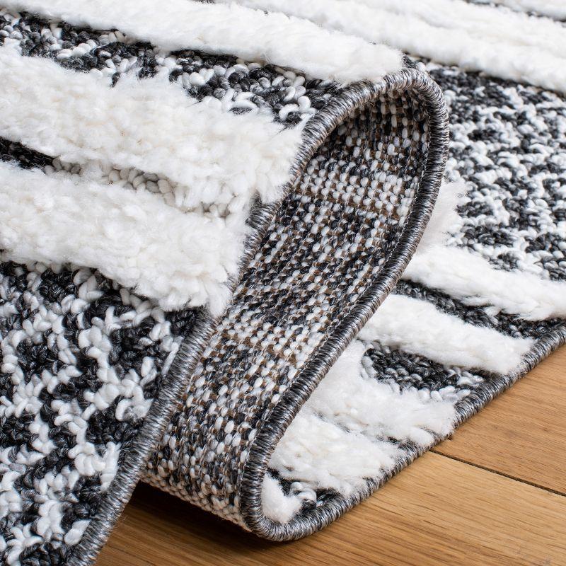 Moroccan Tassel Shag MTS632 Power Loomed Area Rug - Black/Ivory - 3'x5' - Safavieh.