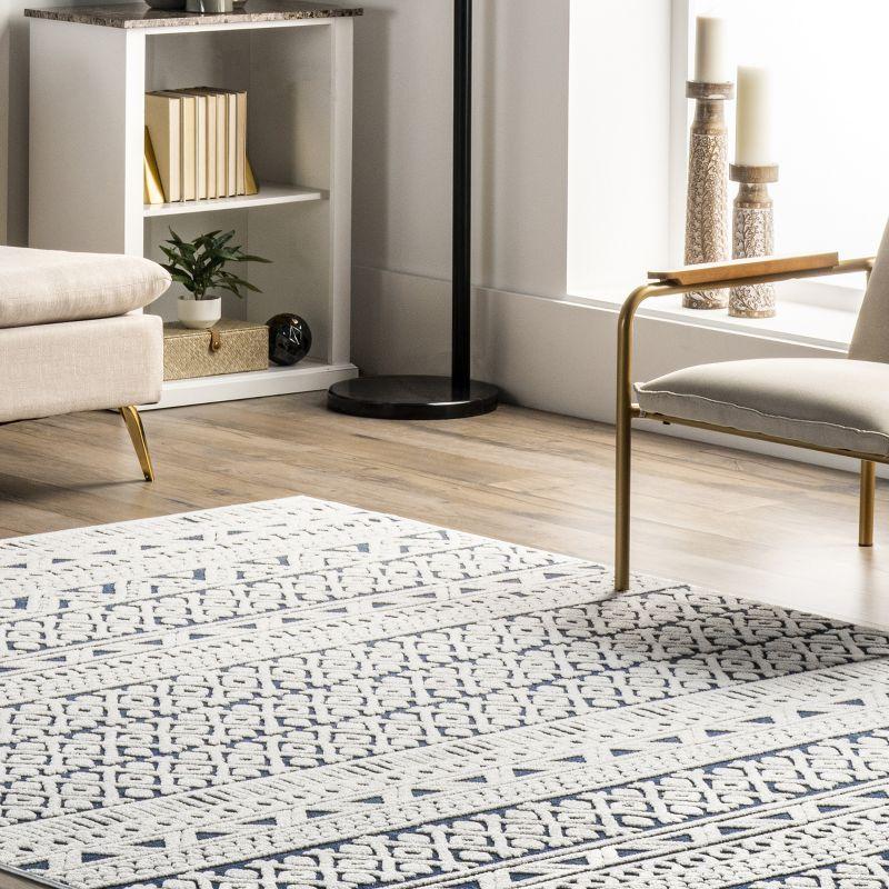 Contemporary Flair Blue Geometric Synthetic Area Rug, 6'7" x 9'