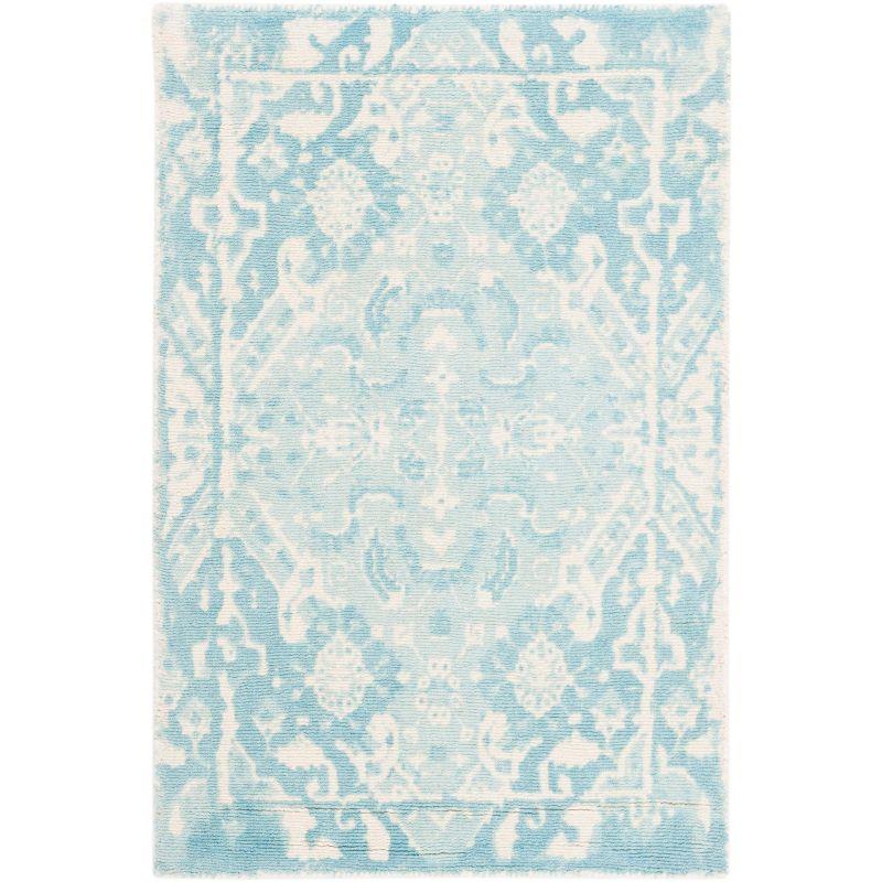 Handmade Light Blue and Ivory Wool Tufted Area Rug