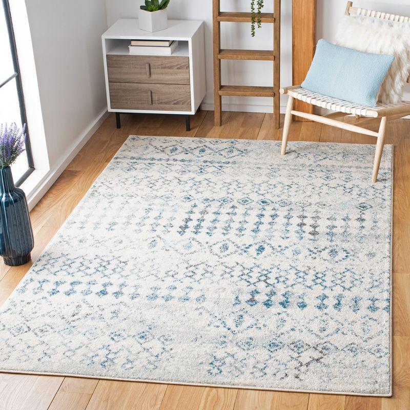 Ivory & Turquoise Geometric 9' x 12' Reversible Synthetic Rug