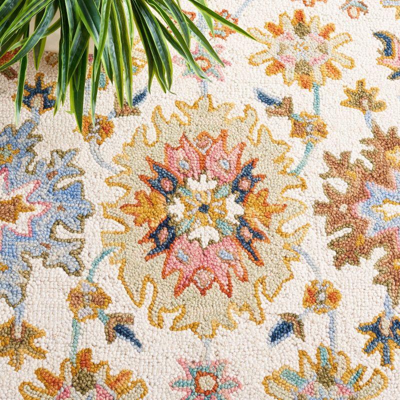 Aspen APN109 Handmade Tufted Area Rug - Ivory/Blue - 6' X 9' - Safavieh