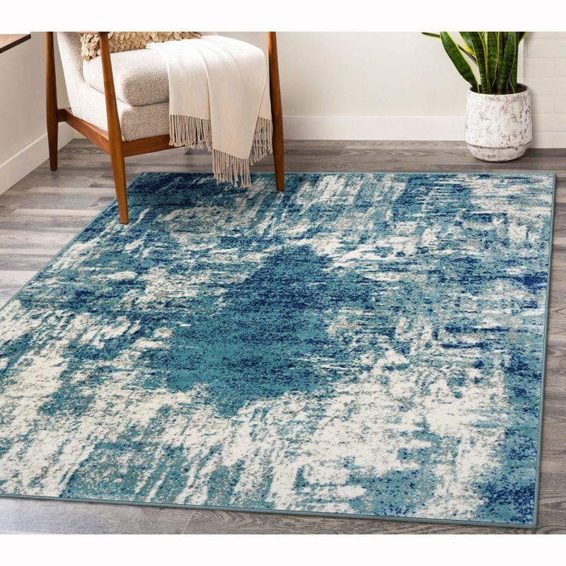 Light Blue Abstract 8' x 10' Stain-Resistant Synthetic Rug