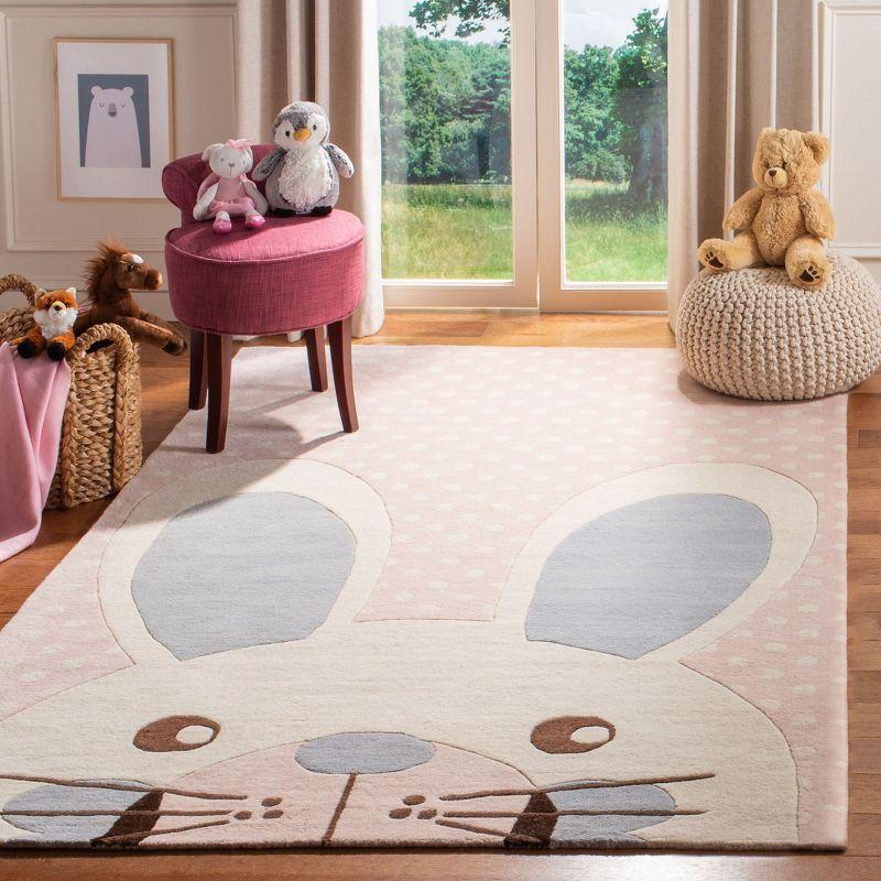Safavieh Kids SFK922 Hand Tufted Area Rug - Pink/Ivory - 8'x10' - Safavieh.