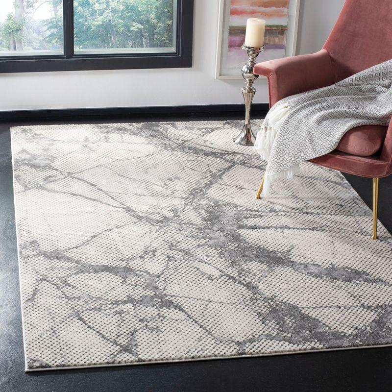 Abstract Silhouette Hand-Knotted Gray Synthetic Area Rug - 5'3" x 7'6"