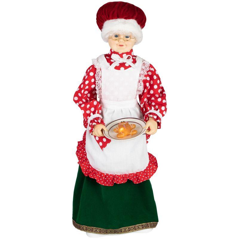 Mrs. Claus with Gingerbread Cookie Figure