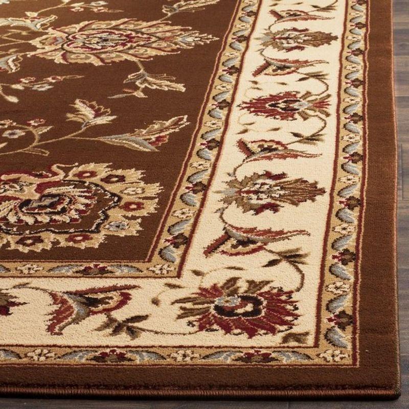 Ivory and Brown Rectangular Synthetic Tufted Area Rug