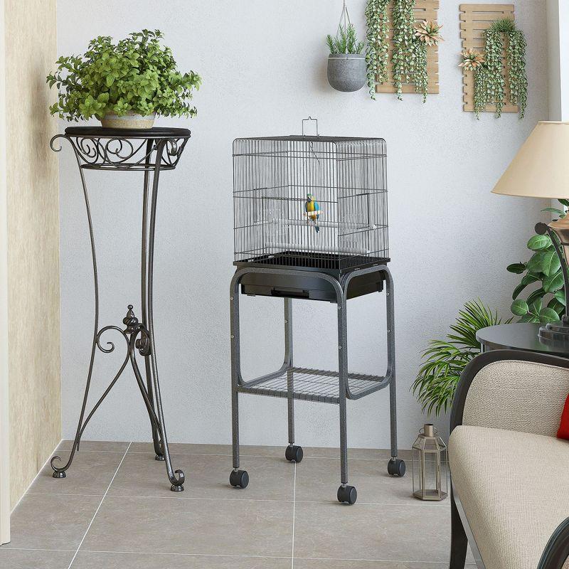 PawHut 44.5" Metal Indoor Bird Cage Starter Kit With Detachable Rolling Stand, Storage Basket, And Accessories - Black