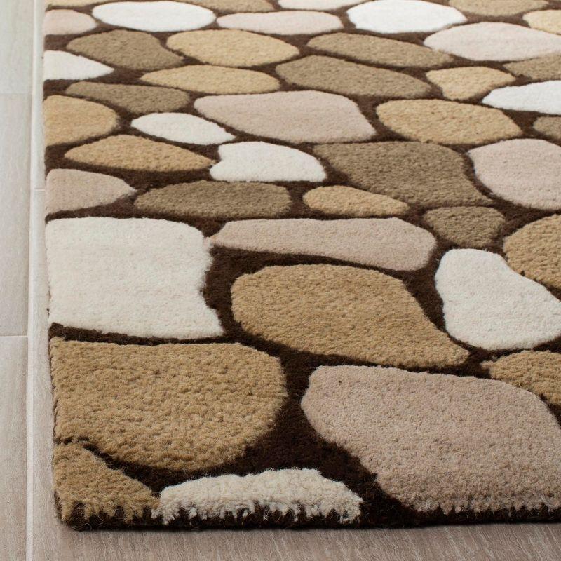 Soho SOH814 Hand Tufted Area Rug  - Safavieh