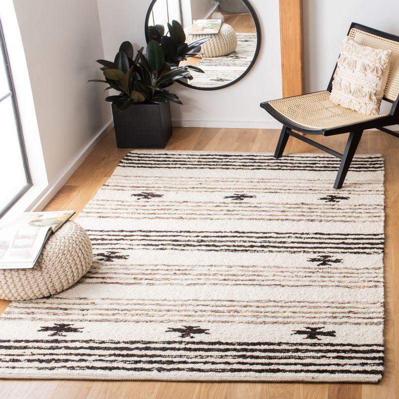 Natura Hand Woven Black and Ivory Wool Area Rug