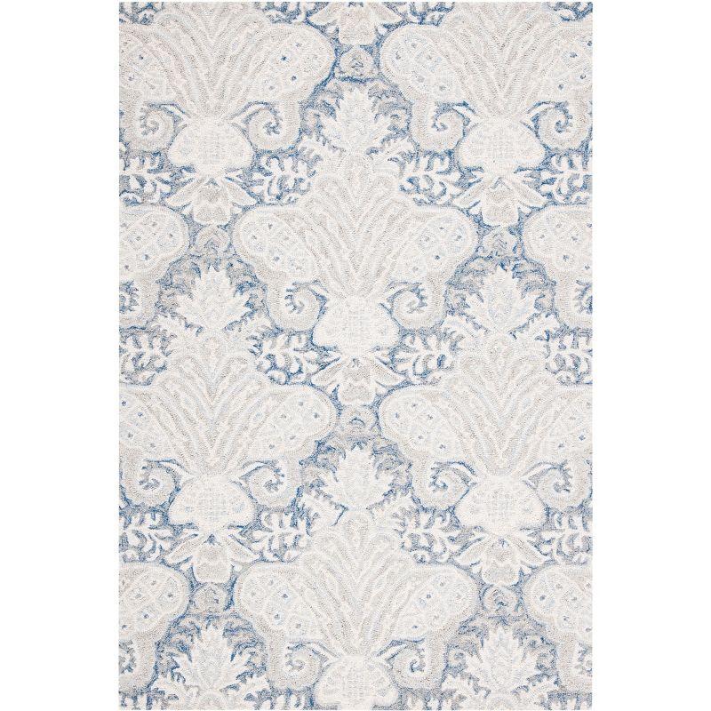 Blue and Ivory Handmade Wool 4' x 6' Area Rug