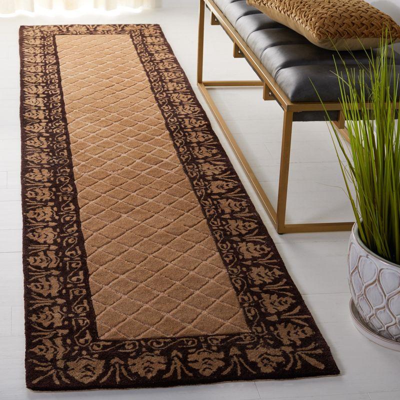 Ivory and Chocolate Hand Hooked Wool Area Rug