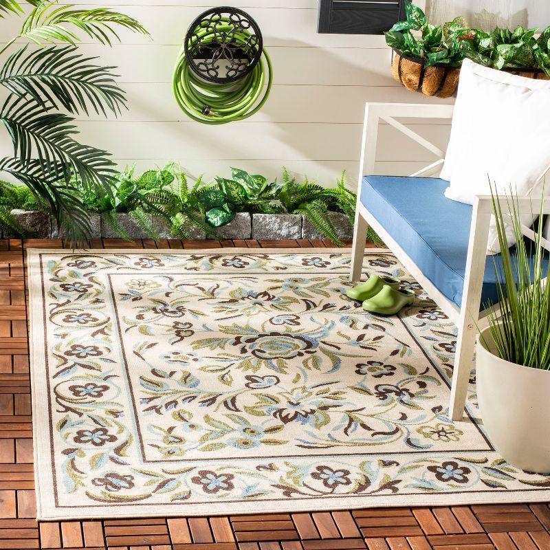 Blue Floral Bliss 8' x 10' Easy-Care Synthetic Area Rug