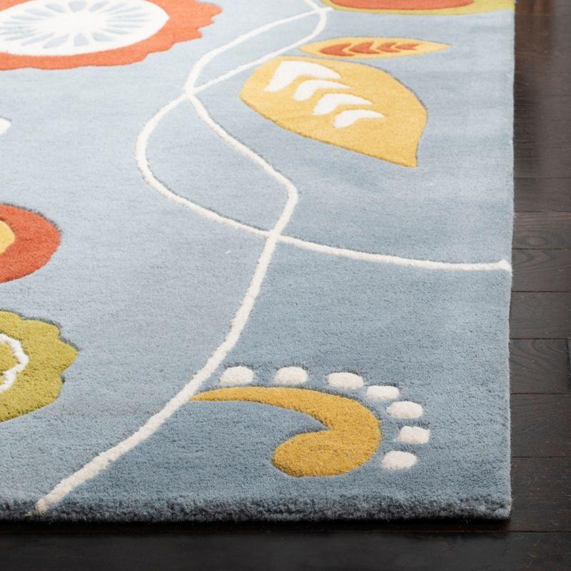 Handmade Light Blue and Multi Wool Round Tufted Rug