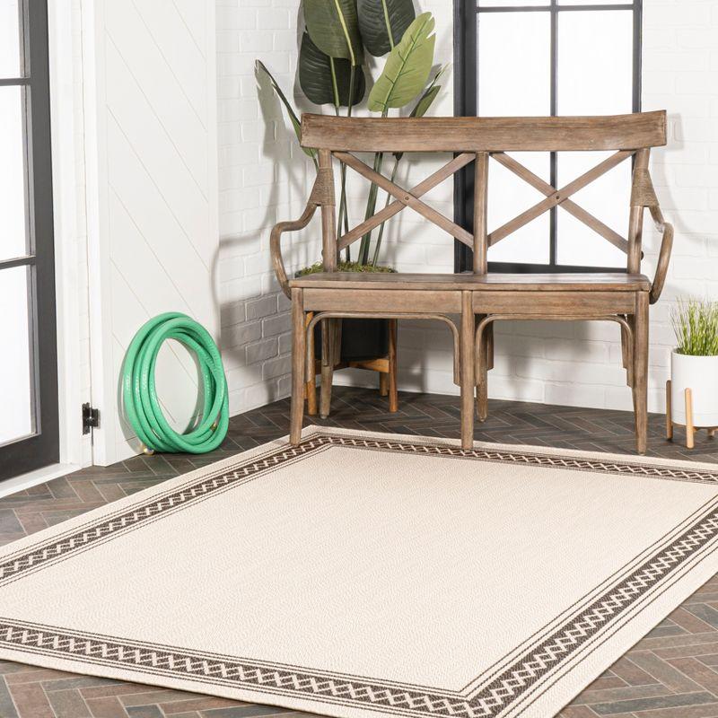 5' x 8' Lucia Classic Diamond Border Indoor/Outdoor Area Rug, Cream/Black - JONATHAN Y