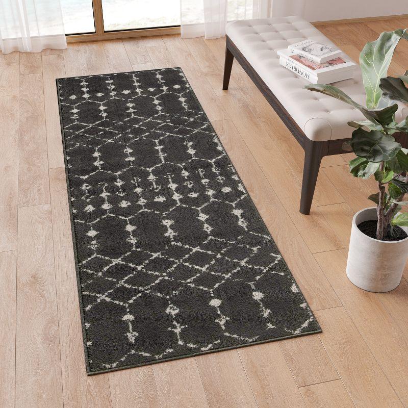 Dark Gray and Ivory Geometric Bohemian Low Pile Rug, 2' x 6'