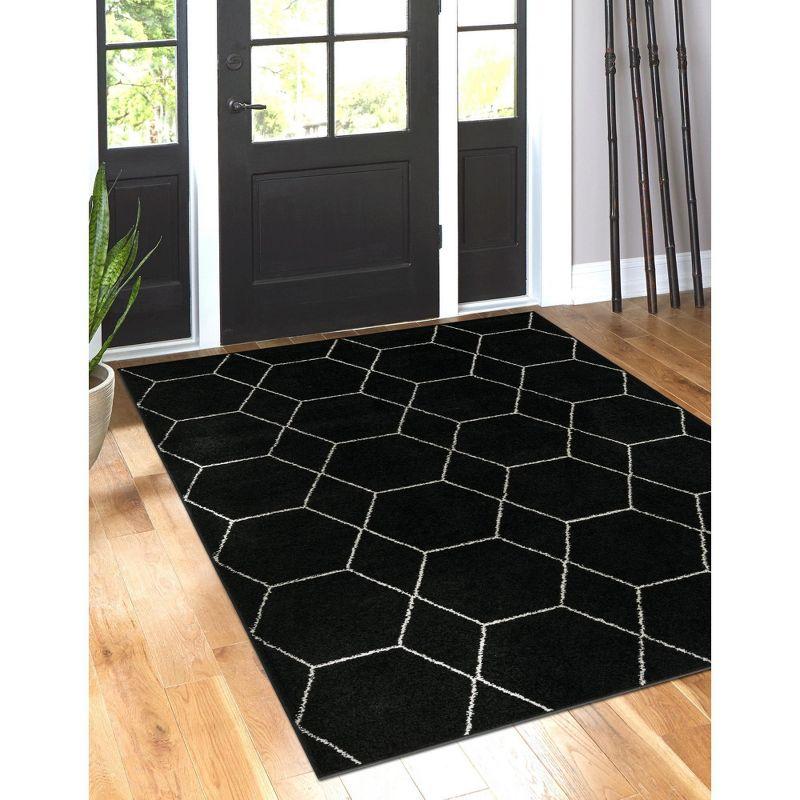 Elegant Black and Ivory Trellis Synthetic Area Rug