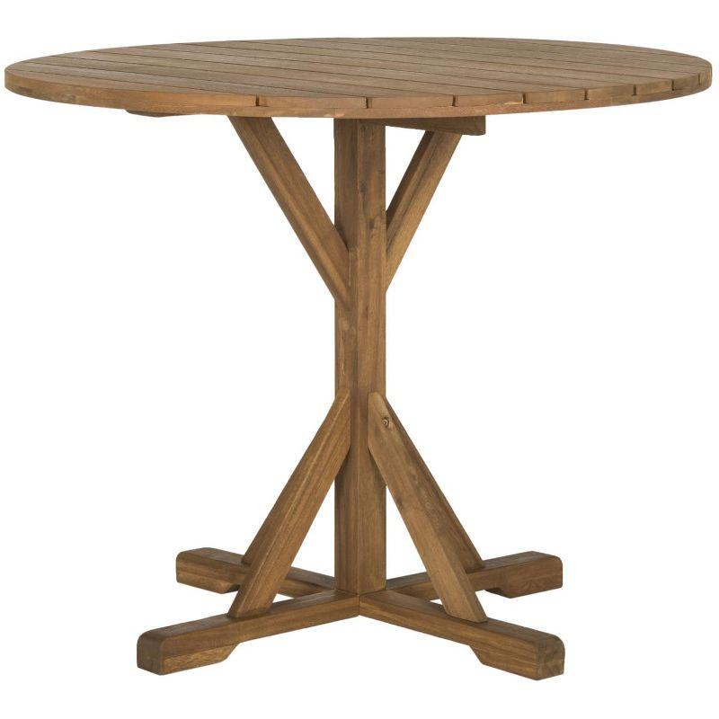 Arcata Round Table - Indoor/Outdoor - PAT6735 - Natural - Safavieh