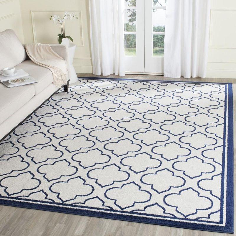 Amherst AMT412 Power Loomed Area Rug - Ivory/Navy - 8'x10' - Safavieh.