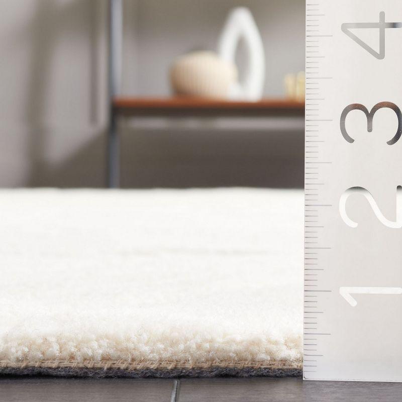 Ebony EBN805 Hand Tufted Area Rug - Ivory - 4'x6' - Safavieh.