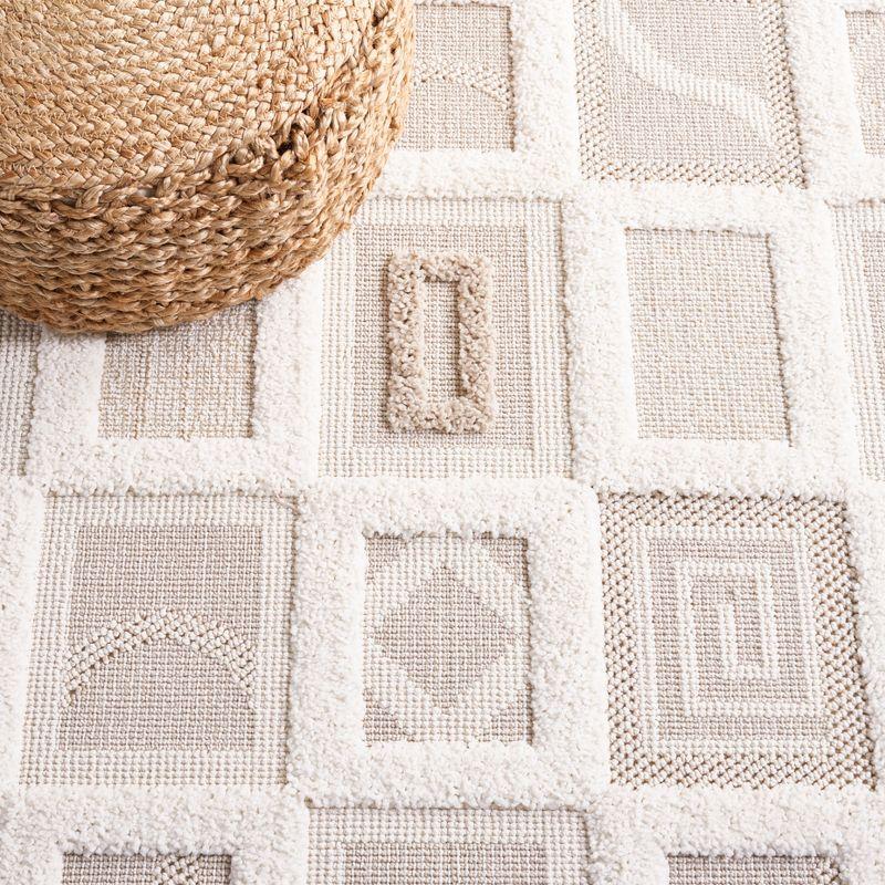 Ivory Geometric 5'3" x 7'6" Synthetic Flat Woven Area Rug