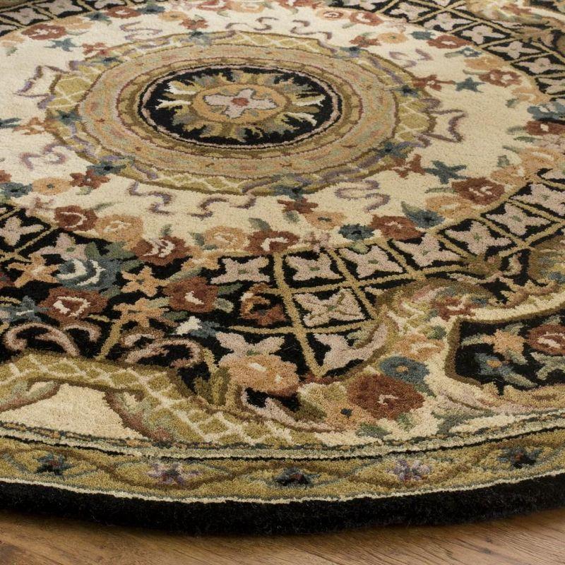 Classic CL304 Hand Tufted Area Rug - Black/Gold - 3'6" round - Safavieh.