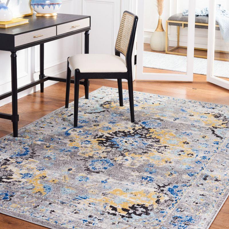 Elegance Redefined Grey & Gold Round Synthetic Area Rug - 8' x 10'