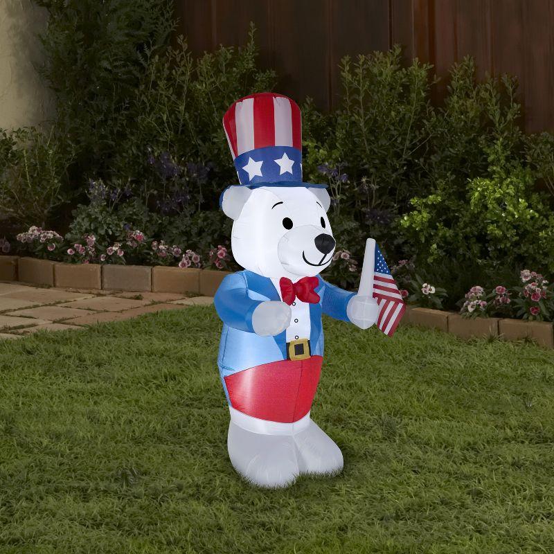 Patriotic Polar Bear Inflatable with American Flag, 4 ft Tall