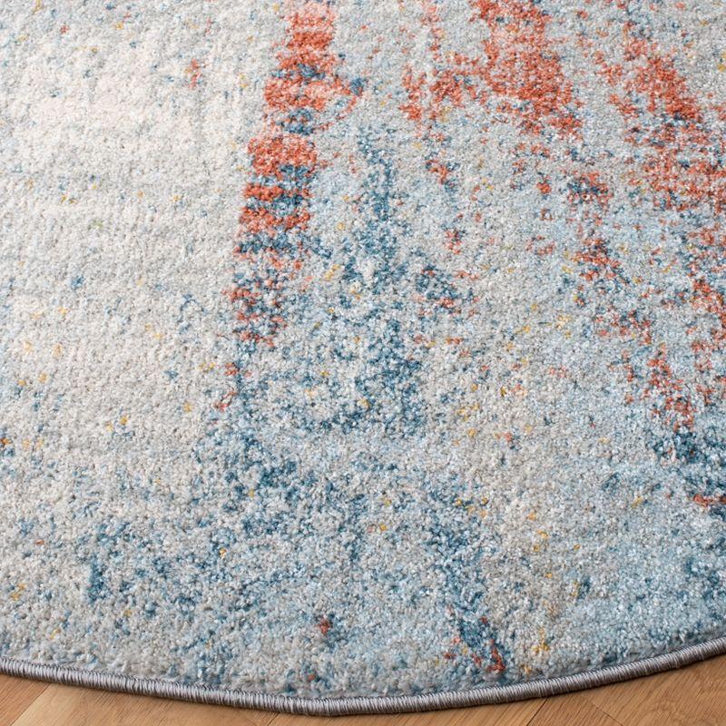 Astral Elegance 59" Round Blue Abstract Synthetic Area Rug