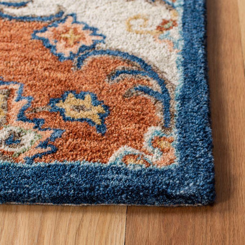 Heritage Blue and Rust Hand-Tufted Wool 4' x 6' Area Rug