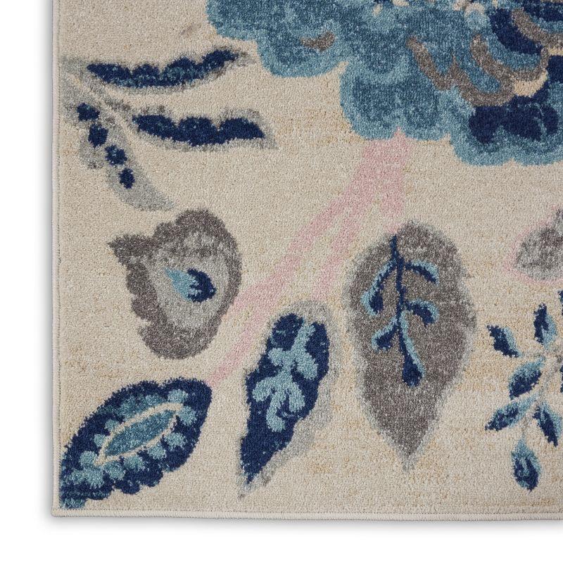 Elegant Ivory and Light Blue Floral 8' x 10' Synthetic Area Rug