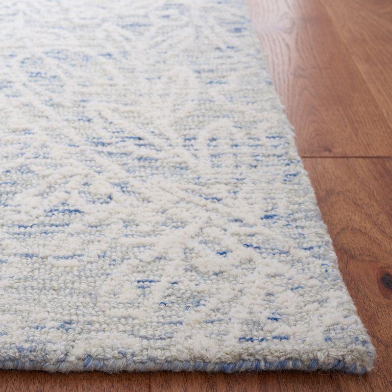 Blue and Ivory Hand-Tufted Wool 8' x 10' Area Rug