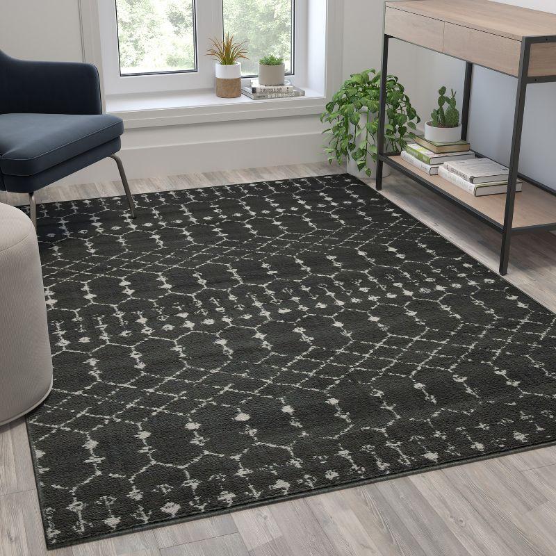 Dark Gray and Ivory Geometric 5' x 7' Synthetic Rug