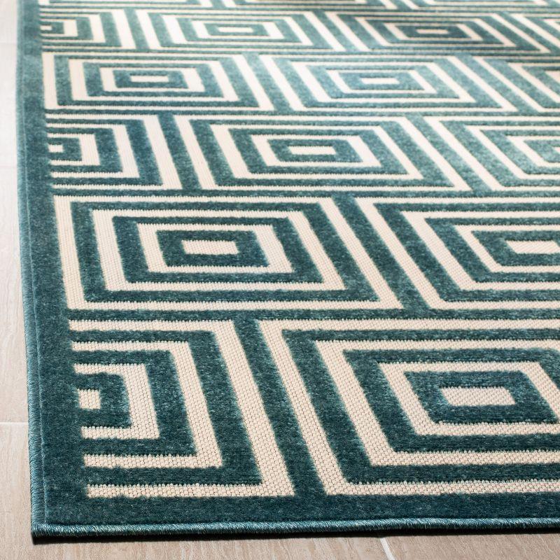 Cottage Elegance 79'' Cream & Turquoise Synthetic Area Rug