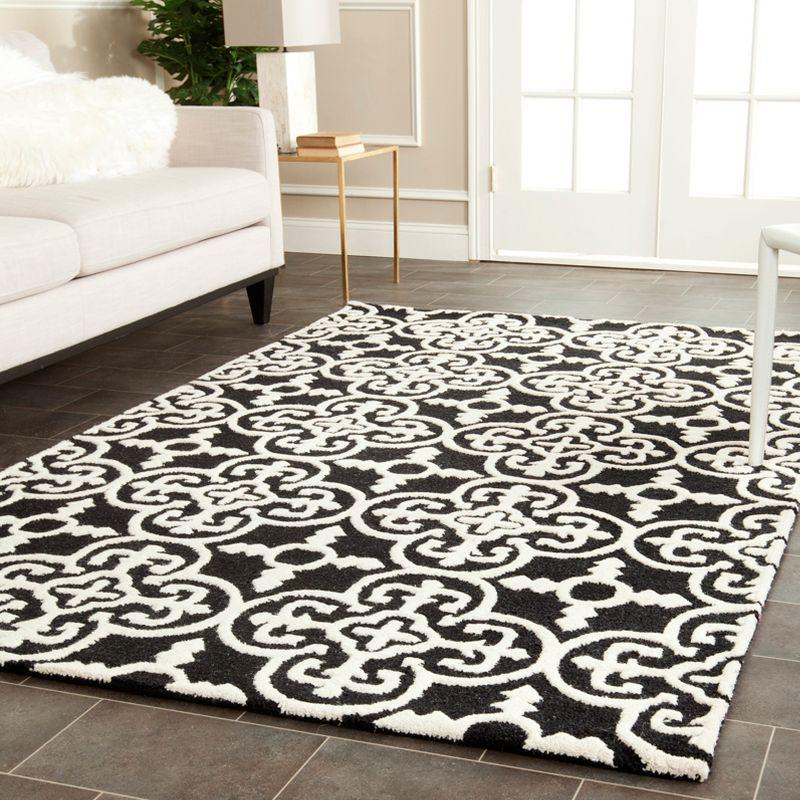 Cambridge CAM133 Hand Tufted Area Rug  - Safavieh