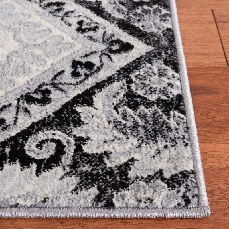 Brentwood Black and Ivory Square Synthetic Area Rug