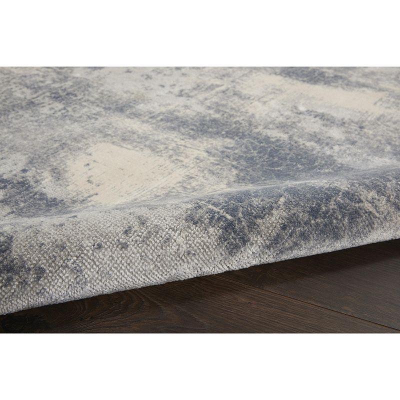 Abstract Blue and Ivory Weathered Textured Area Rug 3'11" x 5'11"