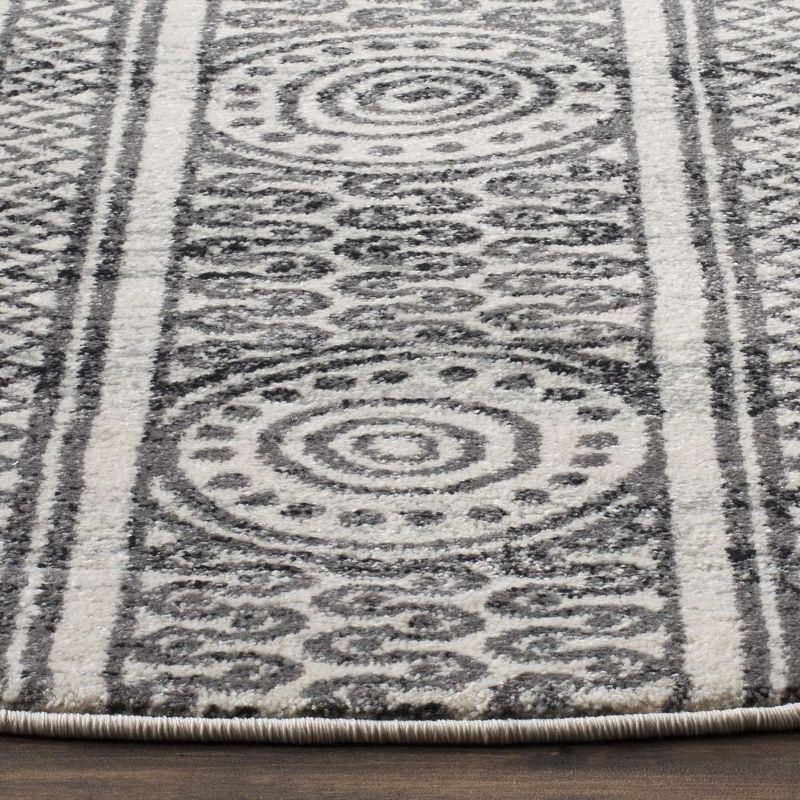 Evoke EVK226 Power Loomed Area Rug - Ivory/Grey - 6'7" Round - Safavieh.