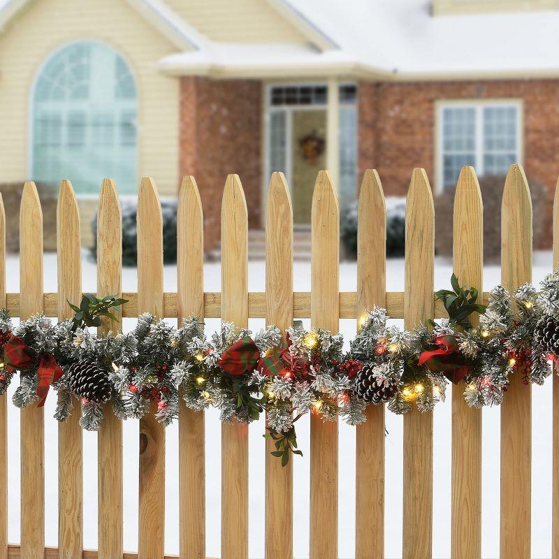 9' Snowy Pine Cone Garland with LED Lights and Bows