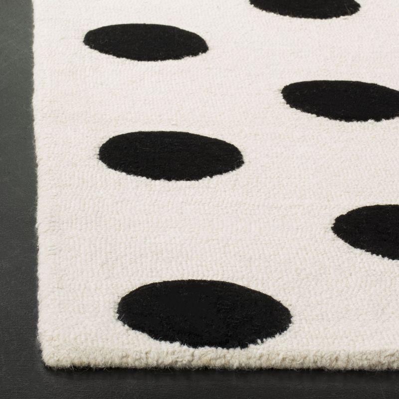 Safavieh Kids Polka Dots SFK904 Hand Tufted Indoor Area Rug - Ivory/Black - 6'x9' - Safavieh