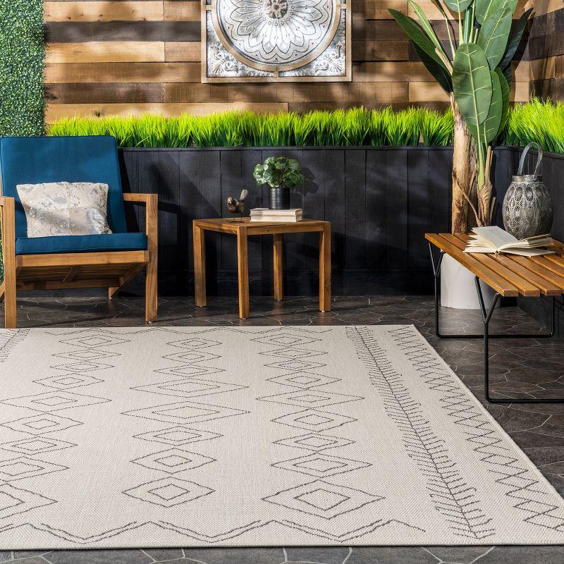 Ivory Geometric Easy-Care Outdoor 7.5' x 10.75' Area Rug