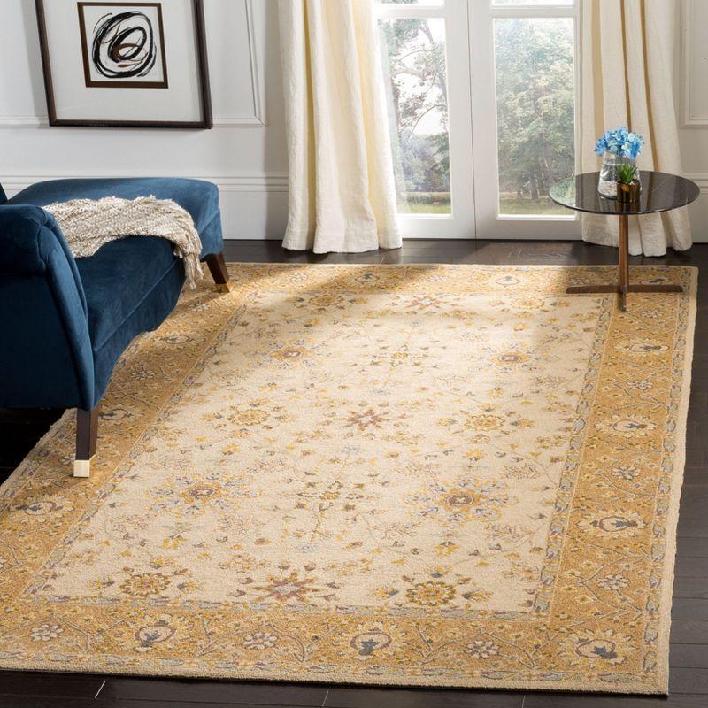 Ivory and Beige Hand-Hooked Synthetic Area Rug, 4' x 6'