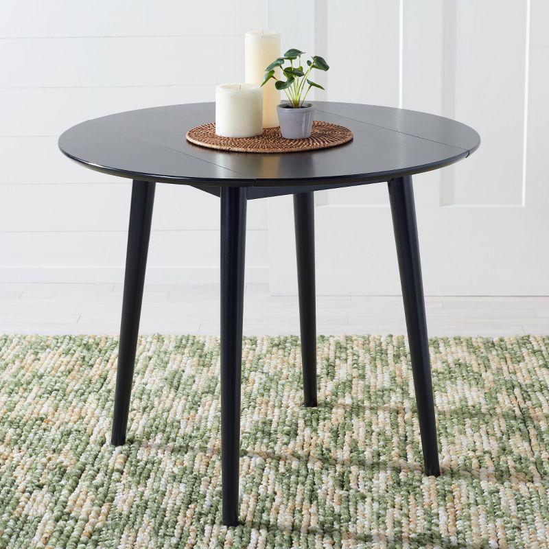 Lovell Folding Round Dining Table - Black - Safavieh